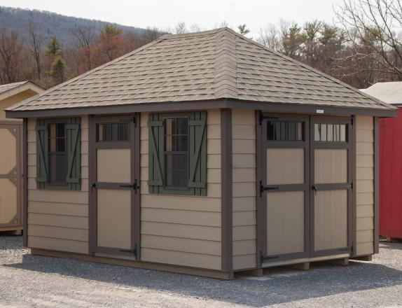 10x14 Hip Roofline Storage Shed With Clay Horizontal Shiplap Siding, Bronze Trim, and Avocado Shutters