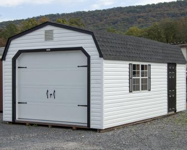 White and Black One-Car Garage With Gambrel Roof